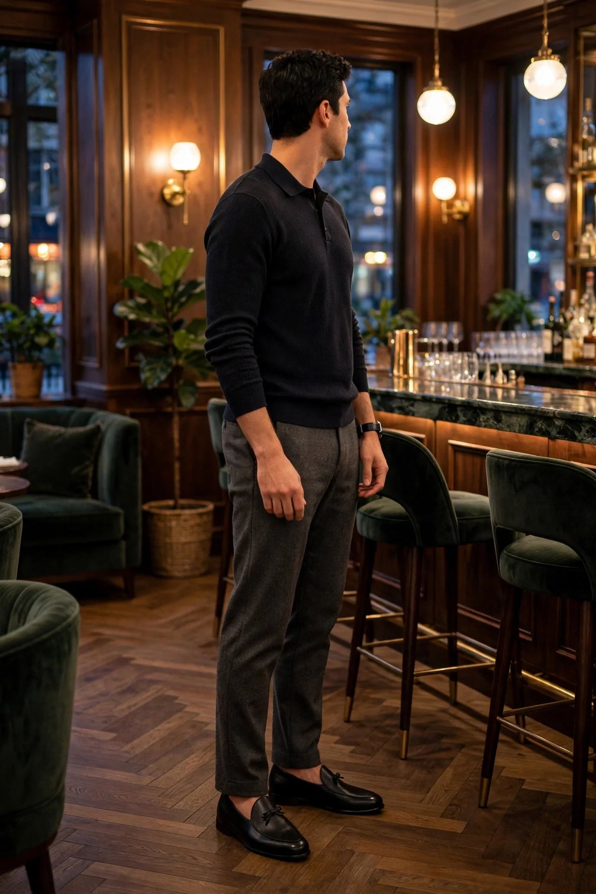 Black pebble-grain Belgian loafers with charcoal flannel trousers