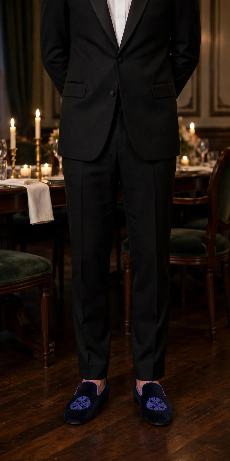 Purple velvet Drake slippers with violet vamp embroidery, worn with a black tuxedo