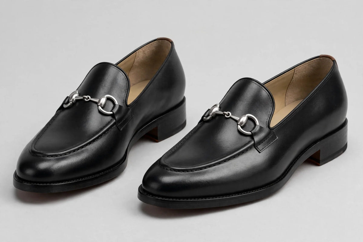 Black leather horsebit loafers