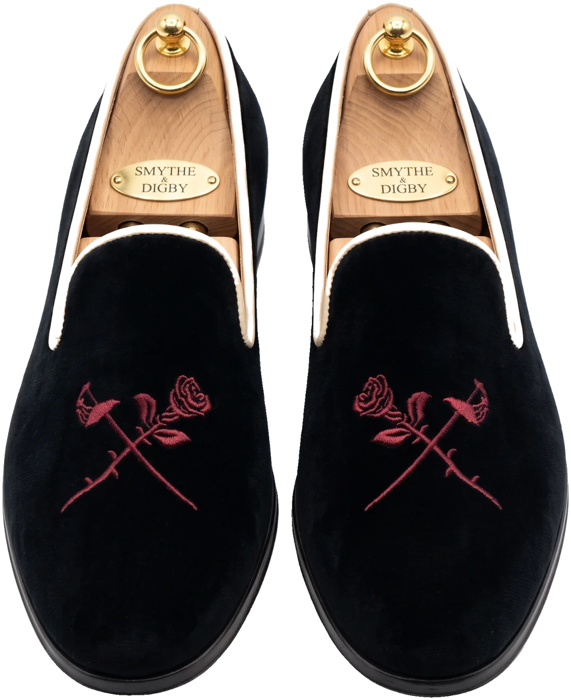 Black velvet wedding loafers with rose and foil embroidery, shown from above with brass-plaque shoe trees